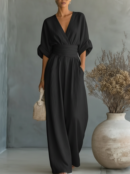 Elegant jumpsuit med V-ringning och hög midja